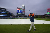 Houston Astros left fielder Chas McCormick walks in the field before Game 3 of baseball's World Series between the Houston Astros and the Philadelphia Phillies on Monday, Oct. 31, 2022, in Philadelphia. The game was postponed by rain Monday night with the matchup tied 1-1. (AP Photo/David J. Phillip)