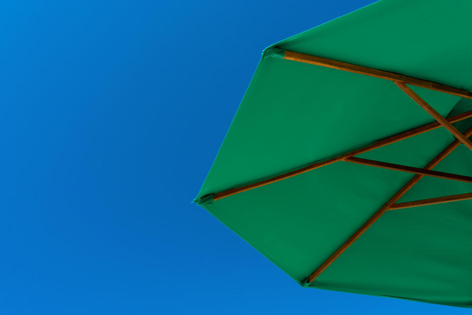 The Sport-Brella beach umbrella has more than 5,000 5-star Amazon reviews (Photo: Getty)