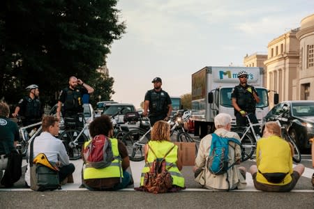 Climate change activists block roads to demand action by U.S. politicians on climate change in Washington D.C.