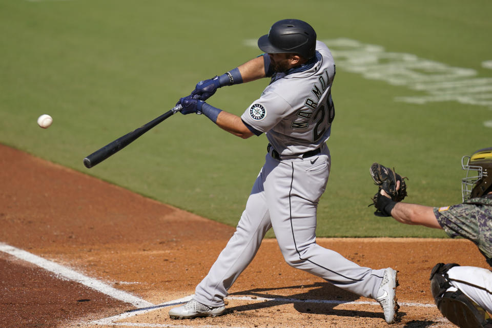 Seattle Mariners' Jose Marmolejos hits a grand slam during the first inning of a baseball game against the San Diego Padres, Thursday, Aug. 27, 2020, in San Diego. (AP Photo/Gregory Bull)