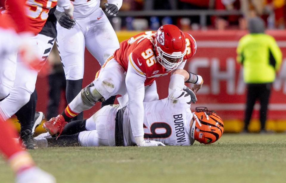 Kansas City Chiefs defensive tackle Chris Jones (95) sacks Cincinnati Bengals quarterback Joe Burrow (9) during the AFC Championship NFL football game at GEHA Field at Arrowhead Stadium on Sunday, Jan. 29, 2023, in Kansas City.