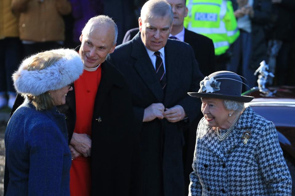 Britain's Prince Andrew, Duke of York, (C) accompanies Britain's Queen Elizabeth II as she arrives for a church service at St Mary the Virgin Church in Hillington, Norfolk, eastern England, on January 19, 2020. - Britain's Prince Harry and his wife Meghan will give up their royal titles and public funding as part of a settlement with the Queen to start a new life away from the British monarchy. The historic announcement from Buckingham Palace on Saturday follows more than a week of intense private talks aimed at managing the fallout of the globetrotting couple's shock resignation from front-line royal duties. (Photo by Lindsey Parnaby / AFP) (Photo by LINDSEY PARNABY/AFP via Getty Images)