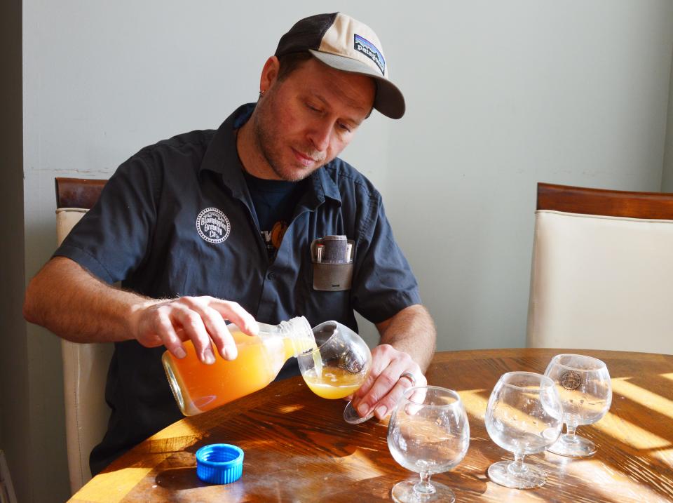 On Monday, Nov. 27, 2023, head brewer Zech Algood pours the first of the Indiana Pale Ale beer created by Bloomington Brewing Company using CV12 hops from Clearview Farm in Monroe County.