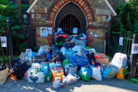 <p>Donations left for those affected by the June 14 fire at the Grenfell Tower block are pictured outside a a Church in Kensington, west London, on June 17, 2017, follwing the June 14 fire at the residential building.<br> Angry London residents heckled Prime Minister Theresa (Niklas Halle’n/AFP/Getty Images) </p>