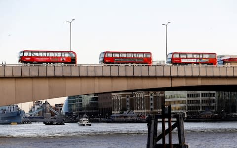 Empty buses on London Bridge after the incident - Credit: PETER NICHOLLS/REUTERS