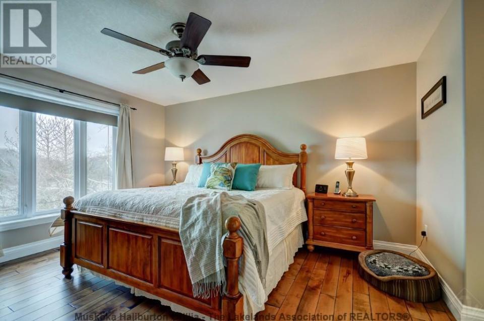 <p><span>359 Falcon Road, Huntsville, Ont.</span><br> The master bedroom has his-and-her closets and an ensuite.<br> (Photo: Zoocasa) </p>