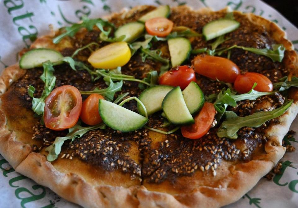 Zaatar Bistro’s Lebanese Spirit is topped with the spice blend za’atar, arugula and fresh vegetables.