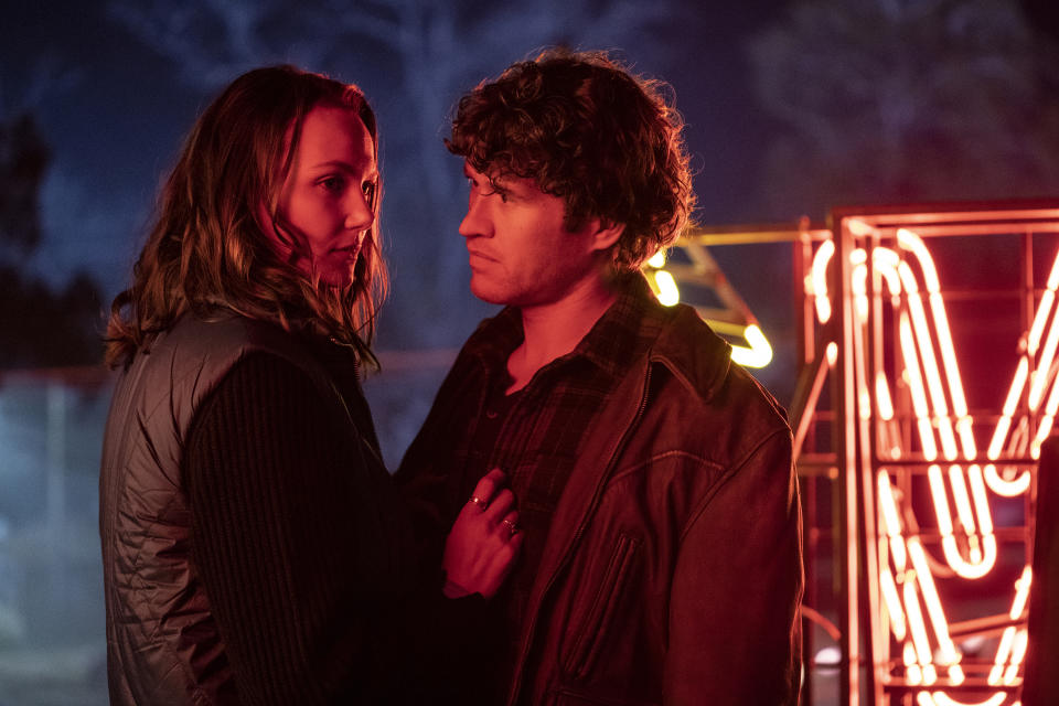 This image released by Universal Pictures shows Andi Matichak, left, and Rohan Campbell in a scene from "Halloween Ends." (Ryan Green/Universal Pictures via AP)