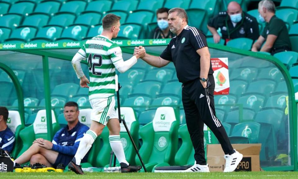 Celtic’s manager, Ange Postecoglou, shakes hands with Callum McGregor during the pre-season friendly with Preston at Celtic Park.