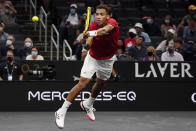 Team World's Felix Auger-Aliassime, of Canada, returns the ball to Team Europe's Matteo Berrettini, of Italy, at Laver Cup tennis, Friday, Sept. 24, 2021, in Boston. (AP Photo/Elise Amendola)