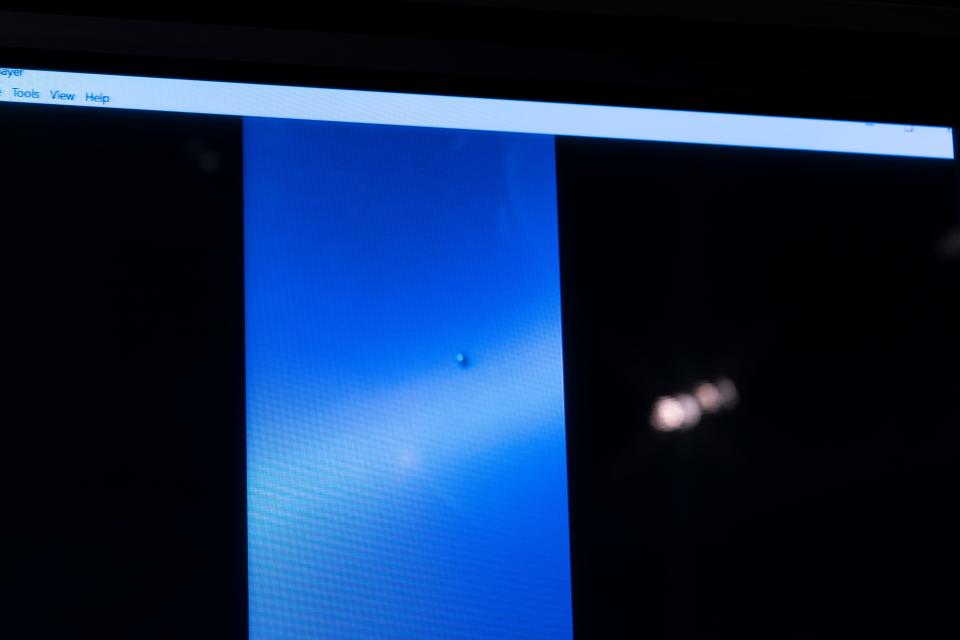 A video of a UAP is paused for display during a hearing of the House Intelligence, Counterterrorism, Counterintelligence, and Counterproliferation Subcommittee hearing on "Unidentified Aerial Phenomena," on Capitol Hill, Tuesday, May 17, 2022, in Washington. (AP Photo/Alex Brandon)