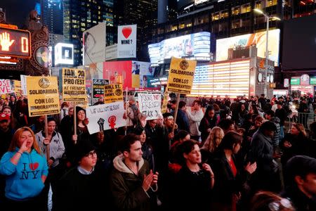 People protest against Republican president-elect Donald Trump in the neighborhood of Manhattan in New York, U.S., November 9, 2016. REUTERS/Eduardo Munoz