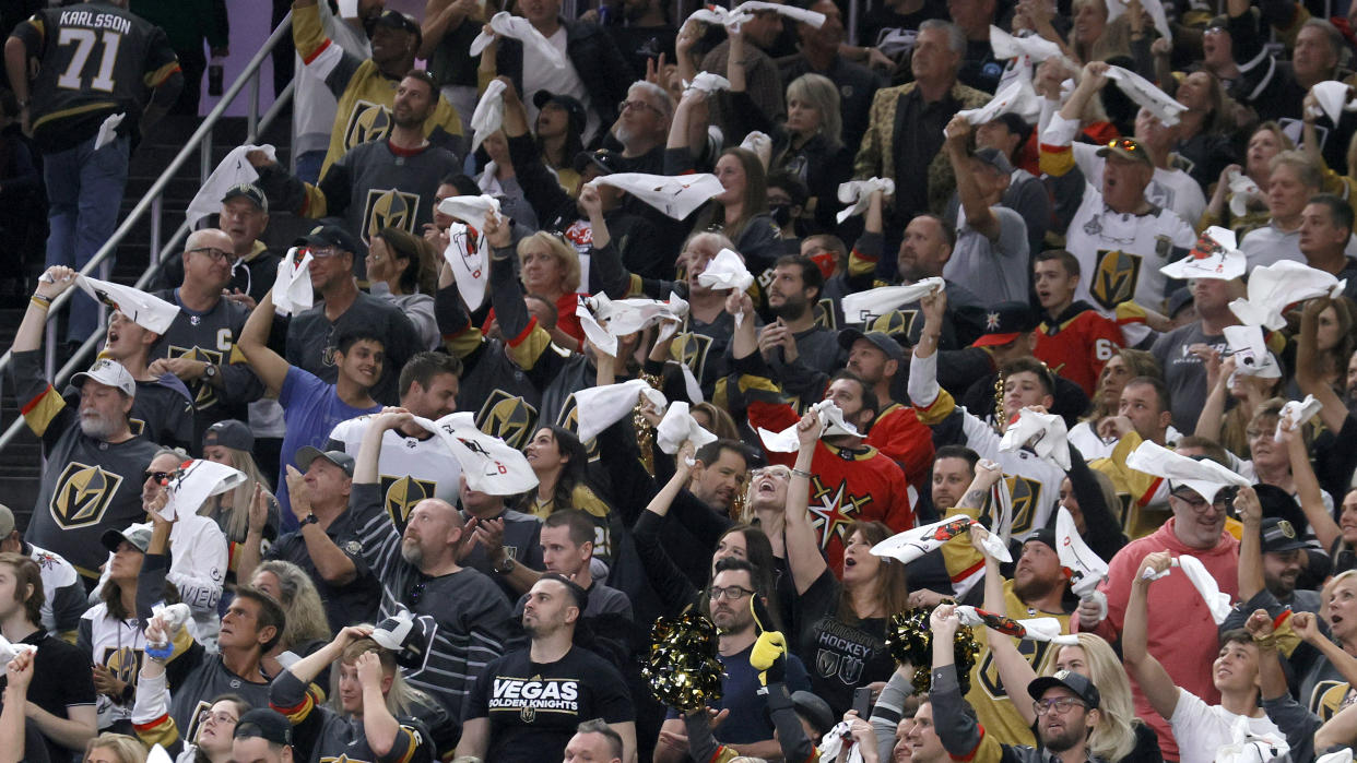 LAS VEGAS, NEVADA - JUNE 10:  Vegas Golden Knights fans celebrate after a first-period goal by William Karlsson #71 of the Golden Knights against the Colorado Avalanche in Game Six of the Second Round of the 2021 Stanley Cup Playoffs at T-Mobile Arena on June 10, 2021 in Las Vegas, Nevada. The Golden Knights defeated the Avalanche 6-3 to win the series.  (Photo by Ethan Miller/Getty Images)