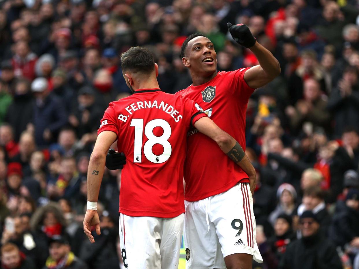 Anthony Martial celebrates after adding United's second of the game: Getty Images