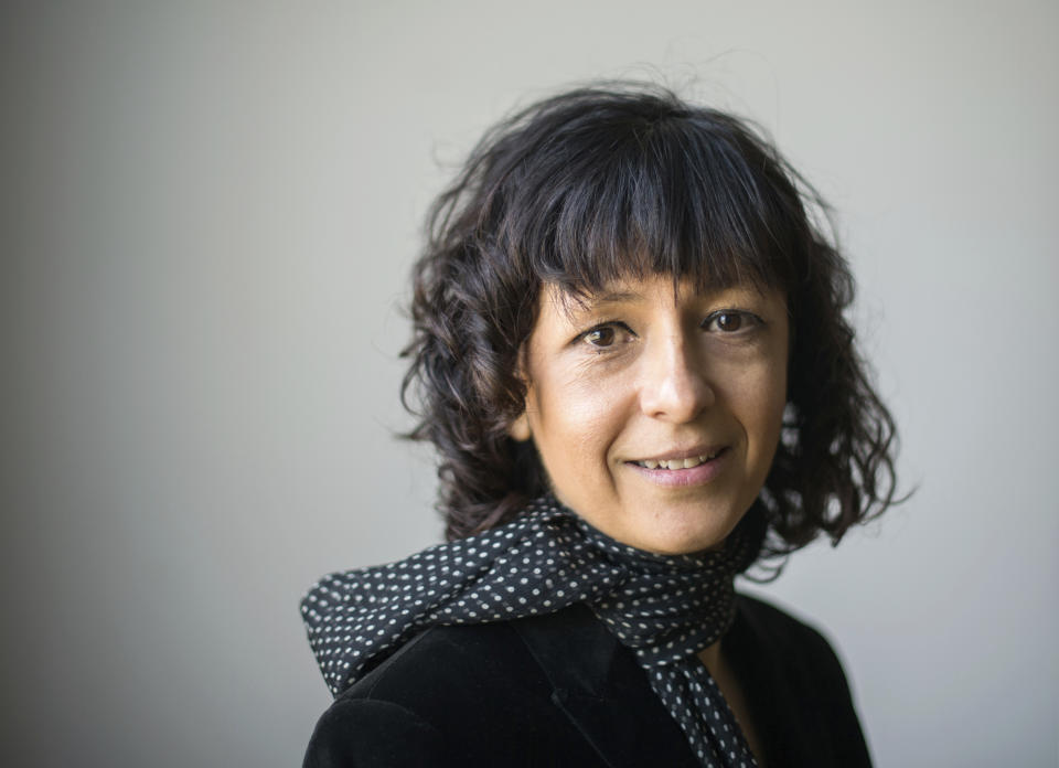 FILE -- In this March 14, 2016 file photo French microbiologist Emmanuelle Charpentier poses for a photo in Frankfurt, Germany. French scientist Emmanuelle Charpentier and American Jennifer A. Doudna have won the Nobel Prize 2020 in chemistry for developing a method of genome editing likened to ‘molecular scissors’ that offer the promise of one day curing genetic diseases. (Alexander Heinl/dpa via AP)