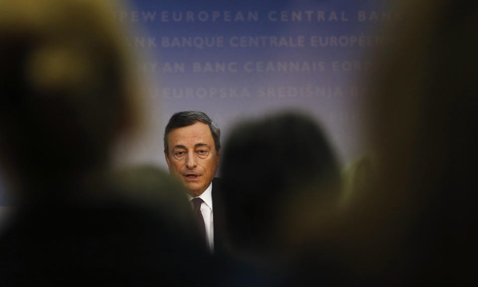 Mario Draghi, President of the European Central Bank (ECB), addresses the media during the ECB's monthly news conference in Frankfurt, September 4, 2014. The ECB cut interest rates to a fresh record low on Thursday and launched a new scheme to push money into the flagging euro zone economy. In a series of measures underscoring growing concern about the currency bloc's health, the ECB cut its main refinancing rate to 0.05 percent from 0.15 percent previously and drove the overnight deposit rate deeper into negative territory, now charging banks 0.20 percent to park funds with it. REUTERS/Kai Pfaffenbach (GERMANY - Tags: BUSINESS HEADSHOT)