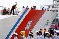 A crew of the U.S. Coast Guard National Security Cutter Bertholf (WMSL 750) throws a line as it arrives for a port call in the first visit by a U.S. cutter in over seven years, Wednesday, May 15, 2019 in Manila, Philippines. Capt. John Driscoll, commanding officer of the Bertholf, told reporters that two Chinese Coast Guard ships were spotted off the South China Sea while they were conducting a joint exercise with Philippine Coast Guard. (AP Photo/Bullit Marquez)