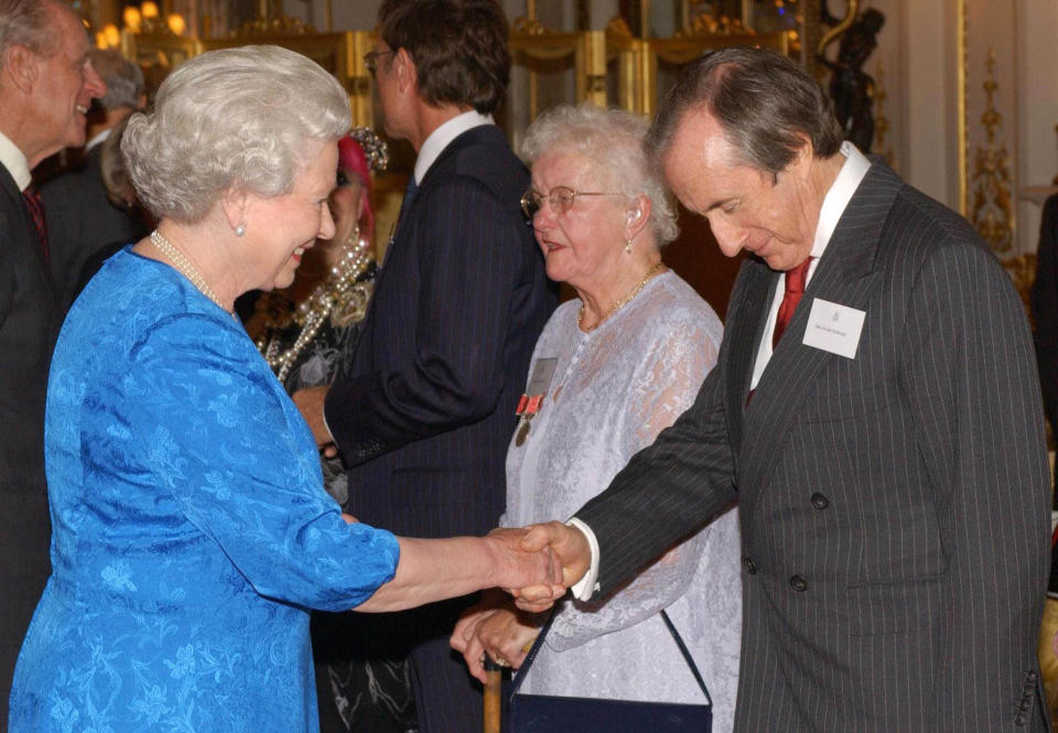 Queen Elizabeth II greets British motor