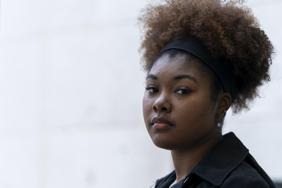 Kaniya Harris, a senior at American University, poses for a portrait at the university's campus in Washington, Monday, Feb. 12, 2024. Abortion rights advocates are trying to get initiatives to protect reproductive on the ballot in several states this year, and one major difference has emerged in their proposed language — whether to include mental health as an exception. (AP Photo/Stephanie Scarbrough)