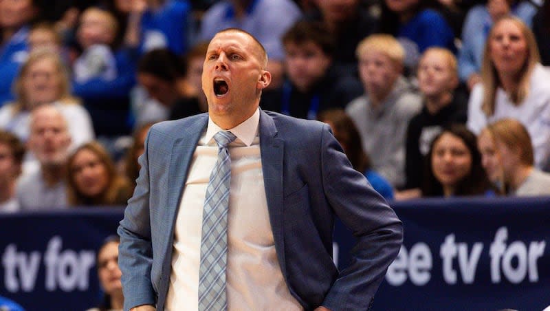 Brigham Young Cougars head coach Mark Pope yells during a men’s college basketball game between Brigham Young University and Baylor University at the Marriott Center in Provo on Tuesday, Feb. 20, 2024.