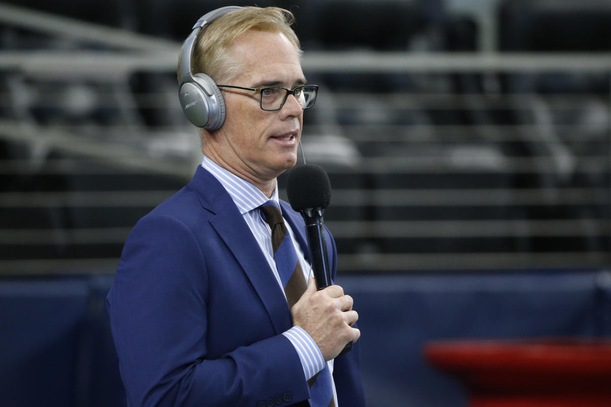 Fox Sports' Joe Buck is pictured before an NFL football game between the Los Angeles Rams and the Dallas Cowboys in Arlington, Texas, Sunday, Dec. 15, 2019. (AP Photo/Michael Ainsworth)