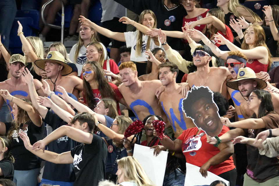 Florida Atlantic fans cheer during the first half of an NCAA college basketball game against Liberty, Thursday, Nov. 30, 2023, in Boca Raton, Fla. (AP Photo/Lynne Sladky)