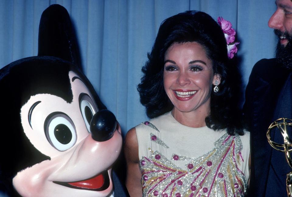 <p>Mickey Mouse makes an appearance at the awards ceremony as Annette Funicello (the original Mouseketeer) smiles for the cameras.</p>