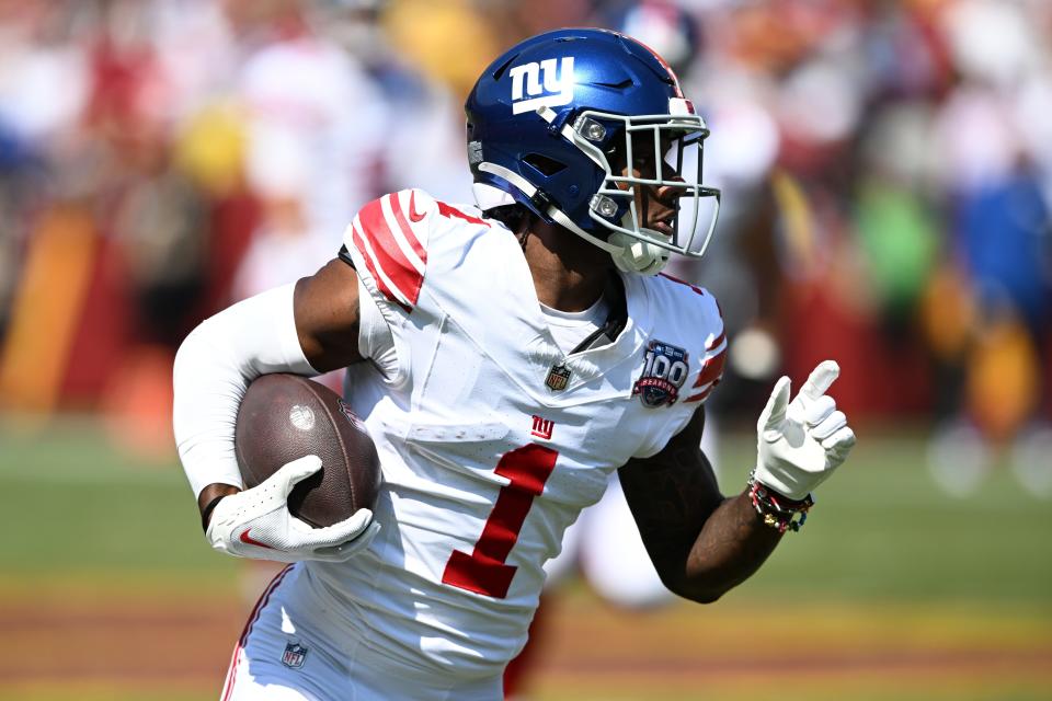 LANDOVER, MARYLAND - SEPTEMBER 15: Malik Nabers #1 of the New York Giants runs with the ball during the first quarter against the Washington Commanders at Northwest Stadium on September 15, 2024 in Landover, Maryland. (Photo by Greg Fiume/Getty Images)