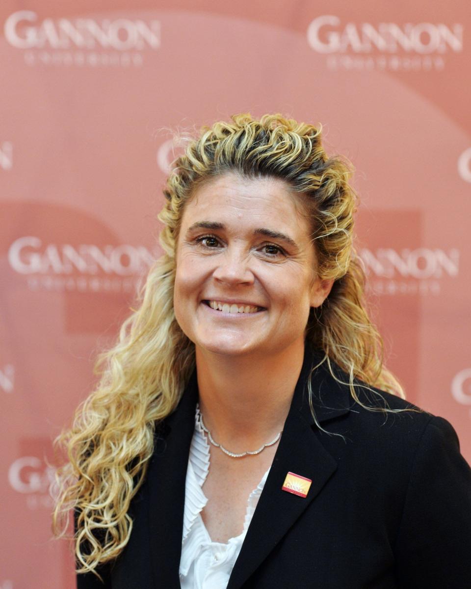 Newly named Gannon University Athletic Director Lisa Goddard McGuirk poses for a portrait following her introductory press conference at Gannon's Old Main Boardroom in Erie on Aug. 25. Previous to her Gannon position, she worked as athletic director at Cedar Crest College in Allentown, Pa. ANDY COLWELL/