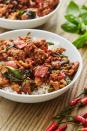 <p>The sauce on this is incredible; don't be anxious about the fish and/or oyster sauces, they lend a bright, salty flavour that isn't fishy at all. Cook up a heaping mound of <a href="https://www.delish.com/uk/food-news/a28997170/how-to-cook-rice/" rel="nofollow noopener" target="_blank" data-ylk="slk:white rice" class="link ">white rice</a>, spoon a ton of this over the top, and you're set! </p><p>Get the <a href="https://www.delish.com/uk/cooking/recipes/a30724903/thai-basil-chicken-recipe/" rel="nofollow noopener" target="_blank" data-ylk="slk:Thai Basil Chicken" class="link ">Thai Basil Chicken</a> recipe.</p>