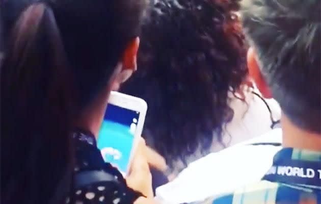 A concert-goer was filmed playing Pokemon Go at a Beyonce gig. Source: Instagram