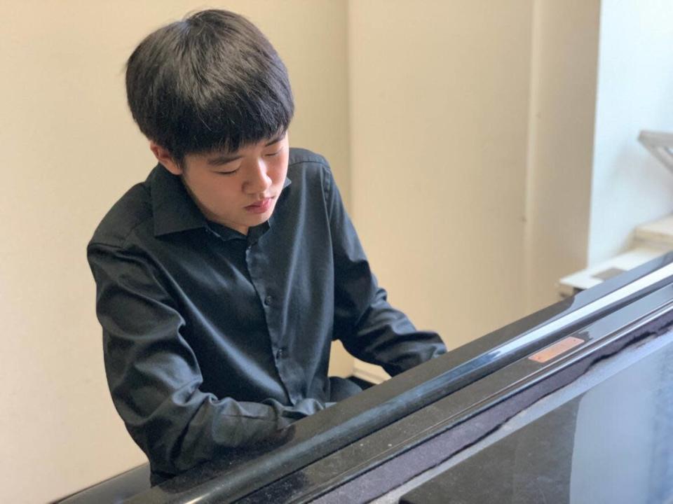 Alex Yang of Halifax received a $5,000 cash prize for his performance at the National Music Festival.  (Submitted by Michael Yang - image credit)