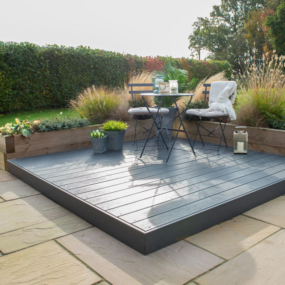 <p> Chose a hearty composite decking to provide a protective area on top of a patio, perfect for entertaining and garden parties. The Ecodek Heritage composite deck kit provides an instant, stylish area that is quick and easy to build. </p> <p> 'Made of a wood & plastic composite,' say the experts at Forest Garden. 'It's designed to have the look and feel of natural timber with the additional benefits of a material that will not stain, warp, split or flake, has minimal fade and is easy to maintain.' </p> <p> Practical and pretty, the grey finish is idea for styling your outdoor area to perfection – matching the colour with bistro dining tables, soft furnishings and accessories. </p>