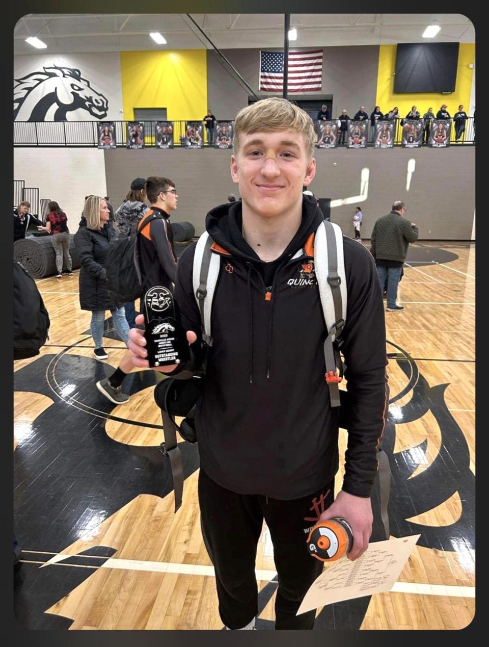 Quincy's Jacob Reif not only took home the gold medal at 132 pounds Saturday at Dansville, he was also voted as the Most Valuable Wrestler at the lighter weights by opposing coaches.