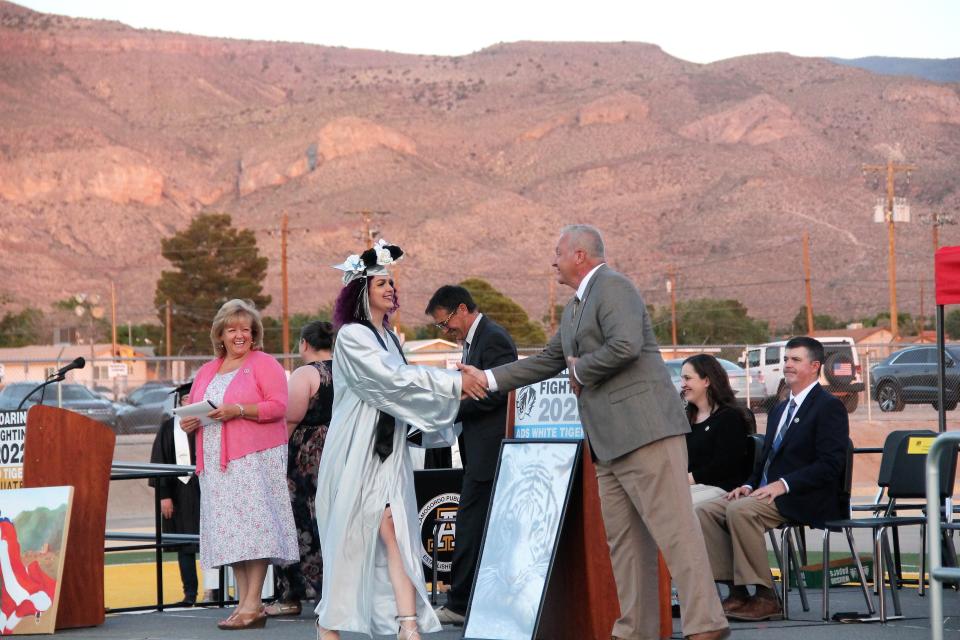An Academy del Sol stident shakes hands with Alamogordo Public Schools Superintendent Dr. Kenneth Moore  at Academy del Sol's graduation ceremony May 26, 2022.

Alamogordo Public Schools alternative high school Academy del Sol celebrated its final commencement ceremony on May 26, 2022.