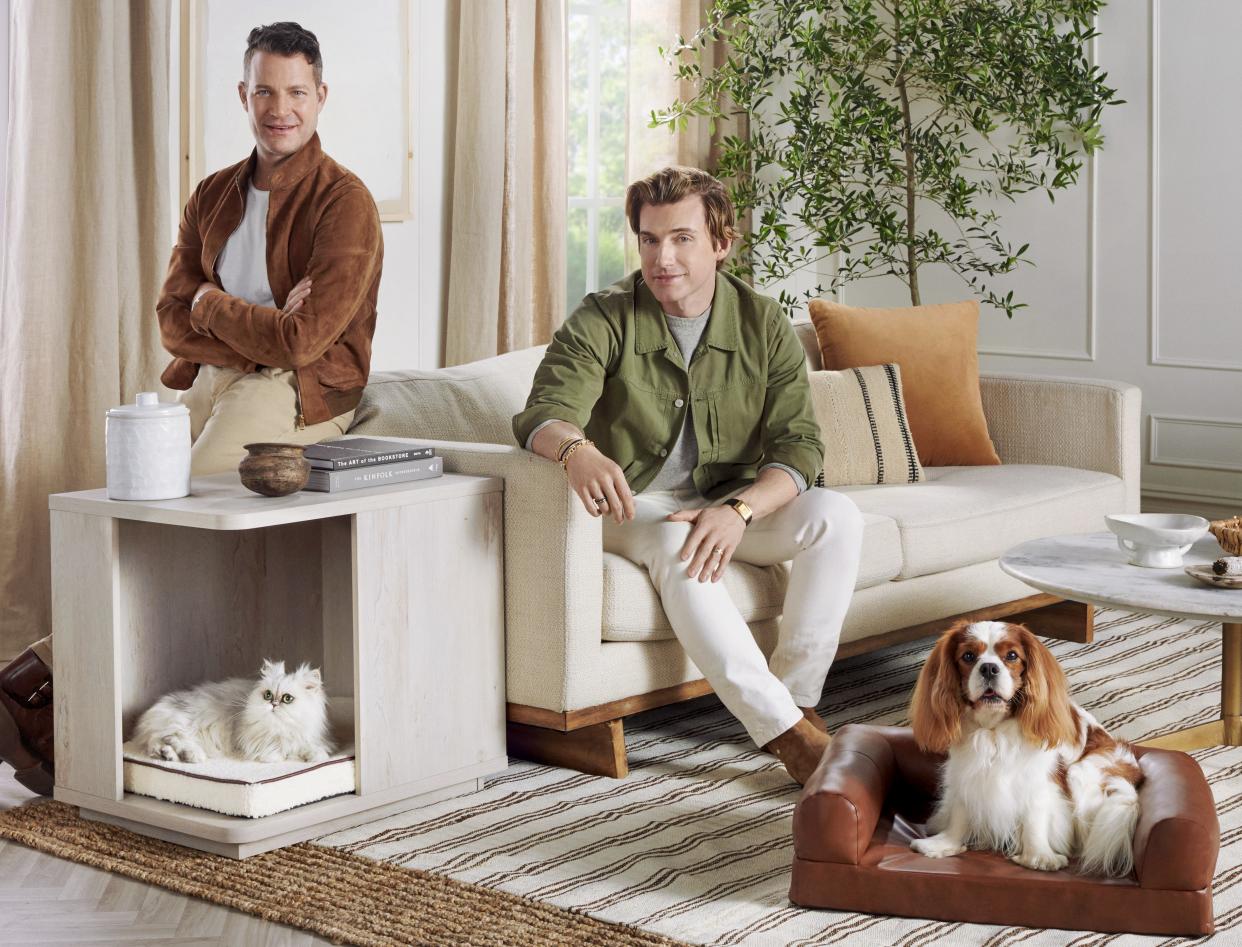  Nate Berkus and Jeremiah Brent with their pet collection. 