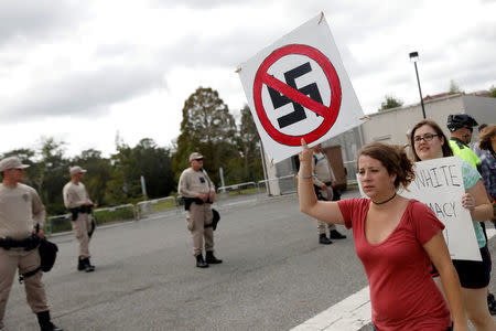 FILE PHOTO: Demonstrators rally before the speech by Richard Spencer, an avowed white nationalist and spokesperson for the so-called alt-right movement, on the campus of the University of Florida in Gainesville, Florida, U.S., October 19, 2017. REUTERS/Shannon Stapleton/File Photo