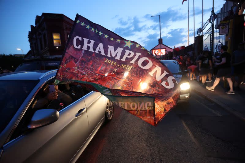 Premier League - Liverpool fans celebrate winning the Premier League