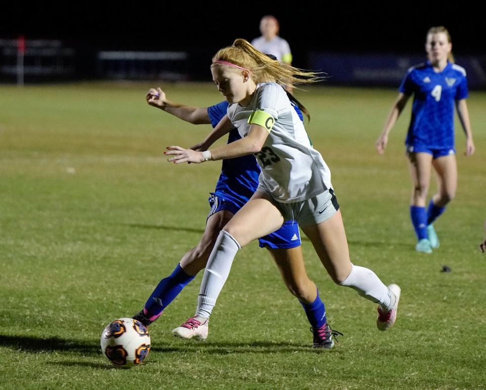 Flagler Palm Coast's Kaitlyn Steiner (23) attempts to drive the ball down the field during a match with Matanzas at Matanzas High School in Palm Coast, Tuesday, Dec.5, 2023.
