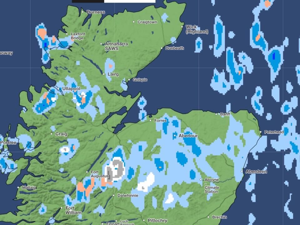 The white and grey spots represent snow fall on this forecast for Friday evening (Met Office)