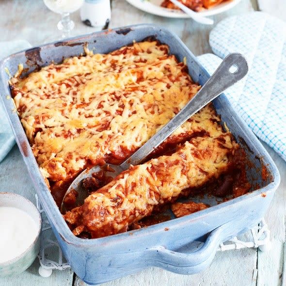 <p>A triple-tested recipe perfect for a midweek chicken fix.<strong><br><br>Recipe: <a href="https://www.goodhousekeeping.com/uk/food/recipes/chicken-ham-and-sweet-potato-enchiladas" rel="nofollow noopener" target="_blank" data-ylk="slk:Chicken, ham and sweet potato enchiladas" class="link ">Chicken, ham and sweet potato enchiladas</a></strong><br><br><br></p>