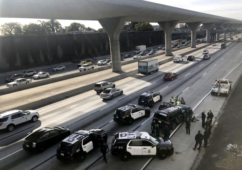 LOS ANGELES CA. FEBRUARY 27, 2020 - An SUV that was carrying a body in a casket and was stolen from a Pasadena church parking lot crashed on the 110 Freeway on Thursday morning during a police pursuit. (Irfan Khan / Los Angeles Times)