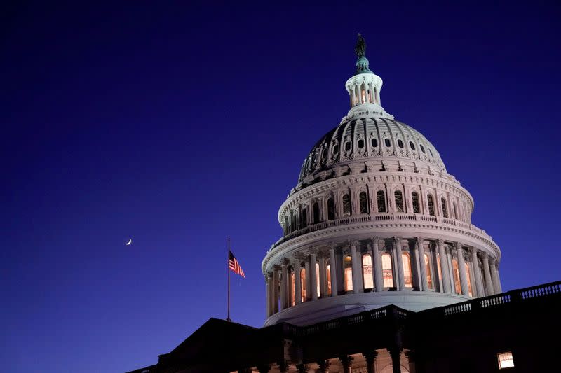 FILE PHOTO: The U.S. Capitol dome is seen at night in Washington