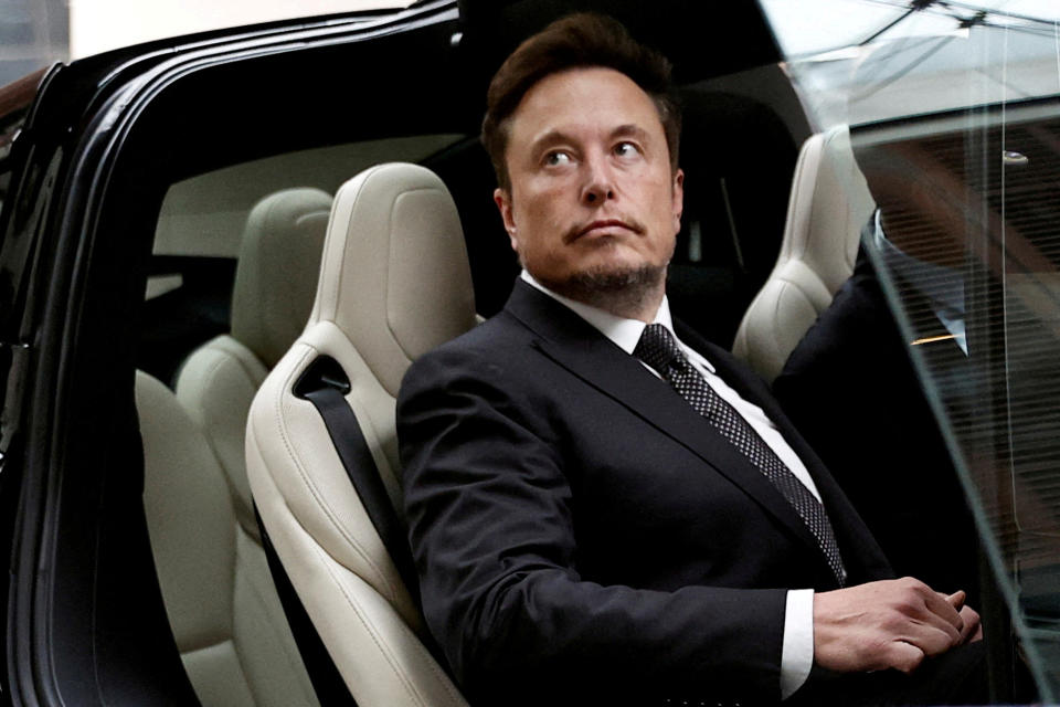 File photo: Tesla CEO Elon Musk boards a Tesla vehicle as it leaves a hotel in Beijing, China, on May 31, 2023.Reuters/Tingshu Wang/File photo