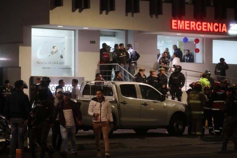 Security forces remain outside a women's clinic where the candidate for the Presidency of Ecuador Fernando Villavicencio was taken after being shot, in Quito, Ecuador, on Wednesday. Photo by Jose Jacome/EPA-EFE