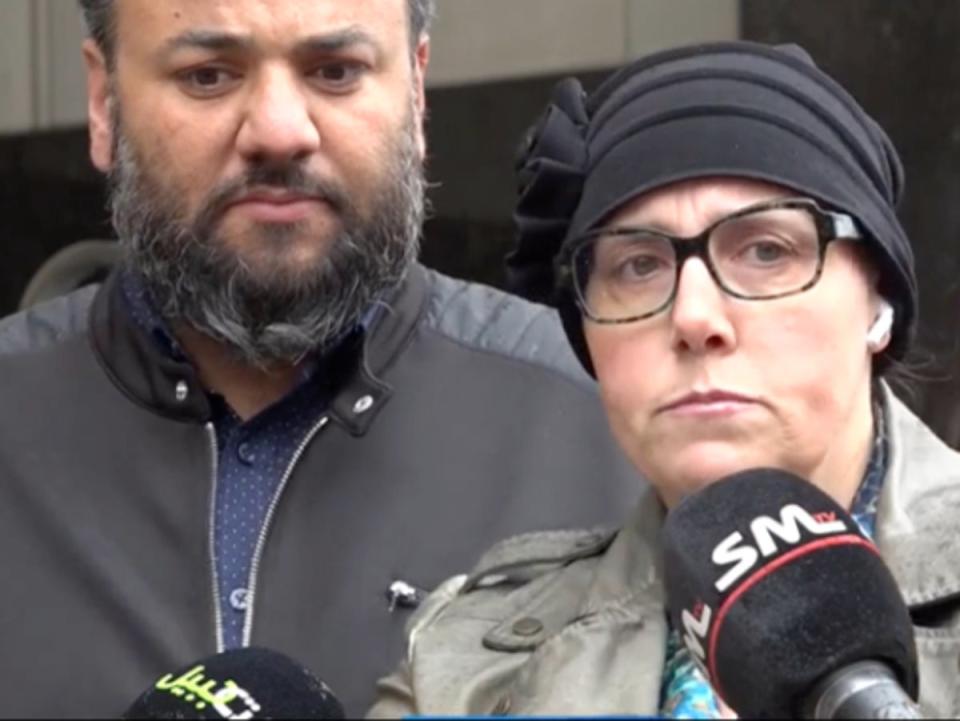 Lisa and Yahya Alarayshi speak with reporters outside of a federal courthouse in Michigan. Civil rights groups have sued the US government on their behalf, alleging agencies haven’t done enough to rescue their family members, Palestinian-American US citizens trapped in Gaza. (CBS News Detroit)