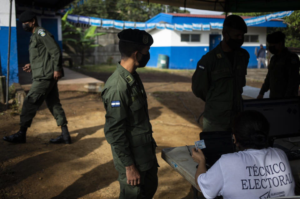 Nicaraguan Army soldiers arrive to be verified to vote during municipal elections, in Managua, Nicaragua, Sunday, Nov. 6, 2022. After the Inter-American Commission on Human Rights expressed concern that "the minimum conditions necessary" to hold free and fair elections do not exist in Nicaragua, President Daniel Ortega's Sandinista National Liberation Front is hoping to expand on the 141 of the country's 153 municipalities that it already controls. (AP Photo)