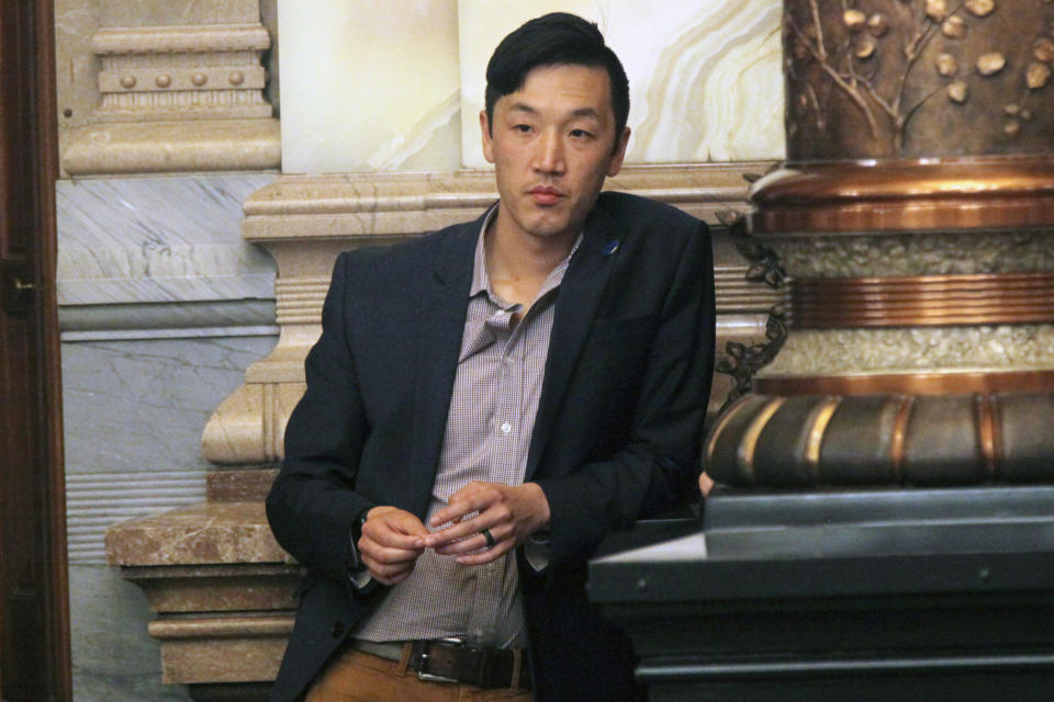 Kansas state Rep. Rui Xu, D-Westwood, watches from the Senate floor as the chamber debates proposed restrictions on foreign ownership of land in Kansas, Saturday, April 6, 2024 at the Statehouse in Topeka, Kan. Xu strongly opposed the bill, viewing it as xenophobic, and Democratic Gov. Laura Kelly has vetoed it. (AP Photo/John Hanna)