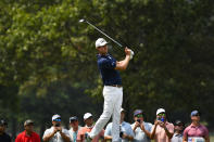 Harris English hits on the seventh hole during the final round in the World Golf Championship-FedEx St. Jude Invitational tournament, Sunday, Aug. 8, 2021, in Memphis, Tenn. (AP Photo/John Amis)