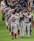 The Boston Red Sox celebrate their win against the Houston Astros in Game 4 of a baseball American League Championship Series on Wednesday, Oct. 17, 2018, in Houston. (AP Photo/Lynne Sladky)